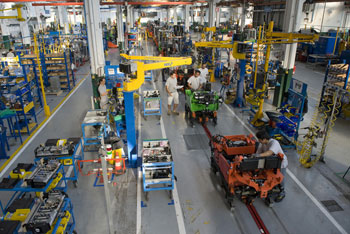 Vue d'ensemble d'une usine qui utilise le système de production de Toyota (TPS) pour maîtriser ses coûts