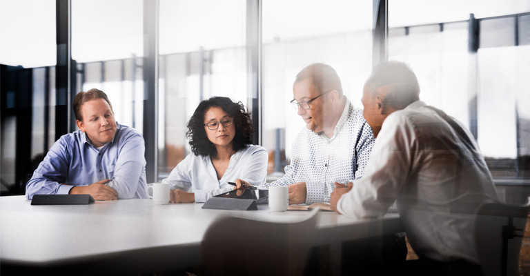 People discussing in meeting